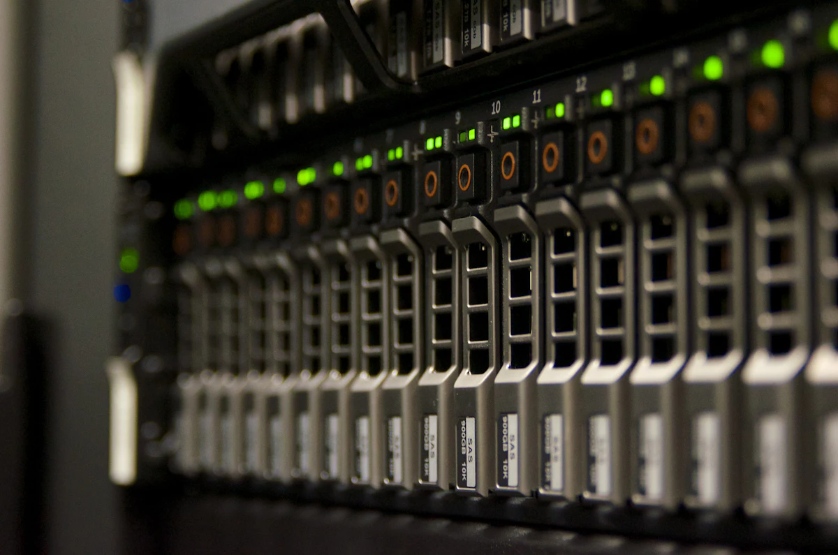 Rack of server drives with green status lights